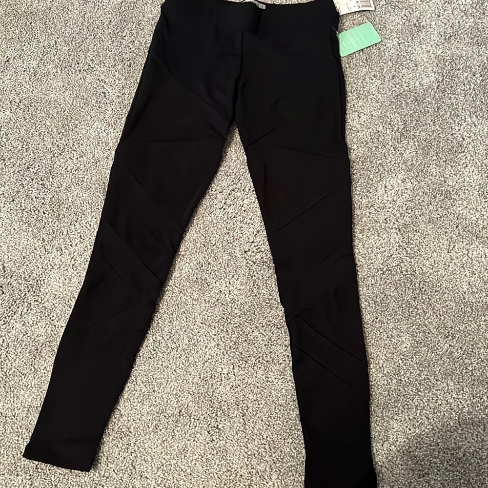 NWT black crisscross sheer net leggings